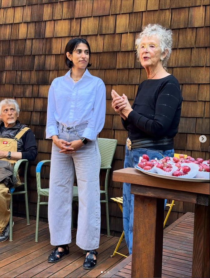 Wendy Bertrand Stands next to District 8 Supervisor Candidate Darshini Patel, introducing her to the Garden Party attendees
